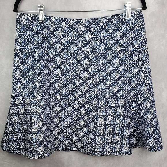 MICHAEL KORS Fluted High Rise Exposed Zip Mini Skirt Navy Blue Floral Womens 10 - Picture 1 of 9
